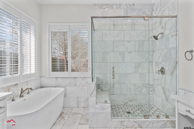 6309 Gleneagles, Tyler, TX 75703 - bathroom with a soaking tub, a stall shower, marble finish floor, and vanity