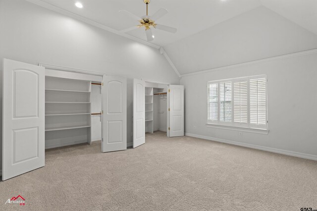 6309 Gleneagles, Tyler, TX 75703 - unfurnished bedroom featuring carpet floors, ornamental molding, baseboards, and multiple closets