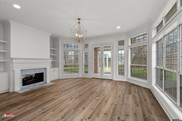 6309 Gleneagles, Tyler, TX 75703 - interior space with french doors and an inviting chandelier