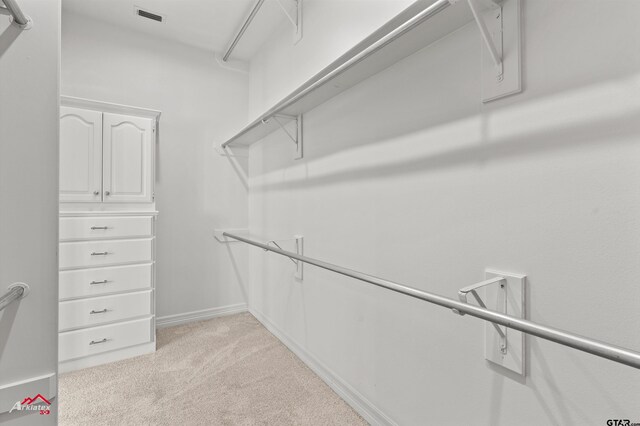 6309 Gleneagles, Tyler, TX 75703 - walk in closet with light carpet and visible vents