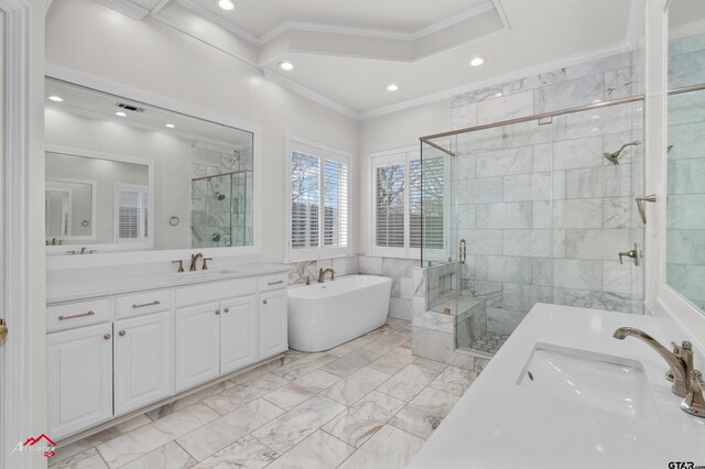 6309 Gleneagles, Tyler, TX 75703 - bathroom featuring tile walls, a shower stall, ornamental molding, vanity, and a freestanding bath