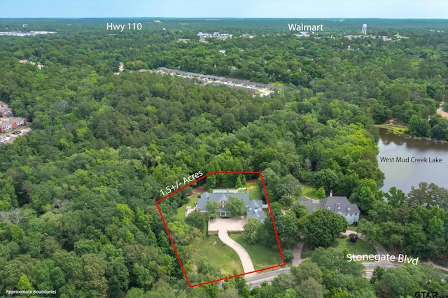 1920 Stonegate Blvd, Tyler, TX 75703 - drone / aerial view with a water view and a view of trees