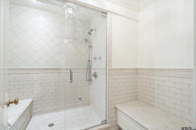 1920 Stonegate Blvd, Tyler, TX 75703 - full bathroom with tile walls, crown molding, and a shower stall