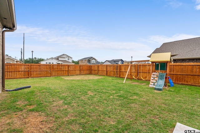 15365 Spring Oaks Dr, Lindale, TX 75771 - fenced backyard with a playground