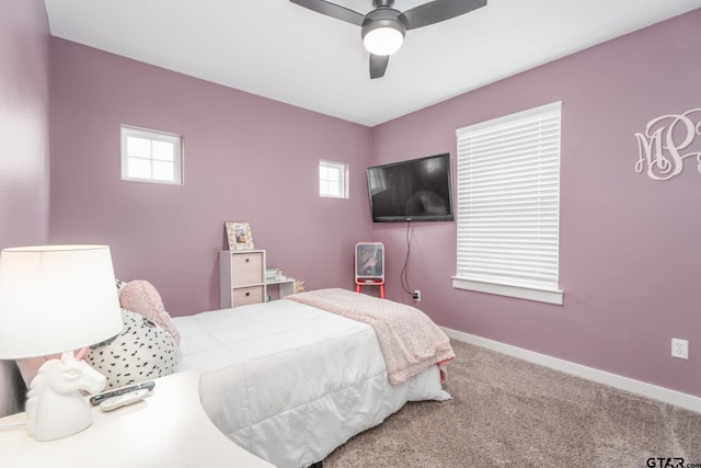 15365 Spring Oaks Dr, Lindale, TX 75771 - carpeted bedroom with multiple windows and ceiling fan