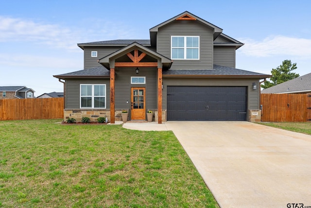 15365 Spring Oaks Dr, Lindale, TX 75771 - view of front of home with a garage, concrete driveway, stone siding, and roof with shingles