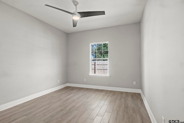 spare room featuring ceiling fan and light wood-type flooring