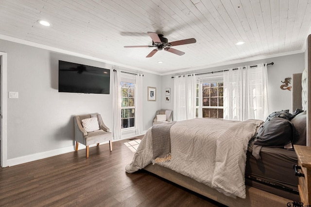 bedroom featuring multiple windows, ornamental molding, ceiling fan, and dark wood-type flooring