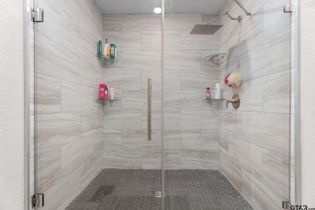 bathroom with an enclosed shower