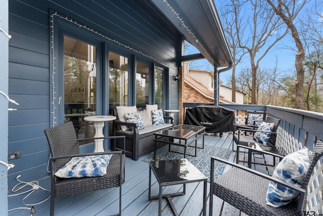 deck featuring an outdoor hangout area