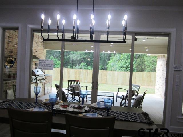 7924 Crooked Trl, Tyler, TX 75703 - sunroom / solarium featuring french doors