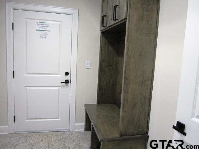 7924 Crooked Trl, Tyler, TX 75703 - mudroom featuring baseboards