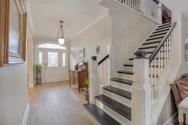 foyer entrance with ornamental molding