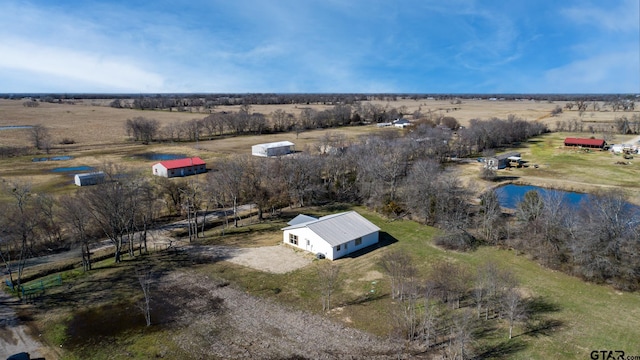 aerial view with a rural view and a water view