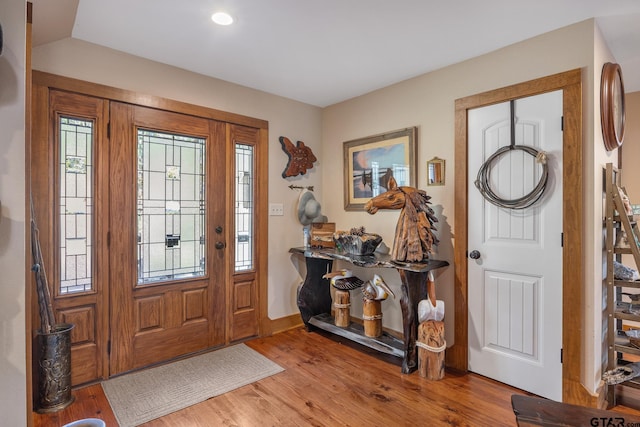 entryway with light hardwood / wood-style floors