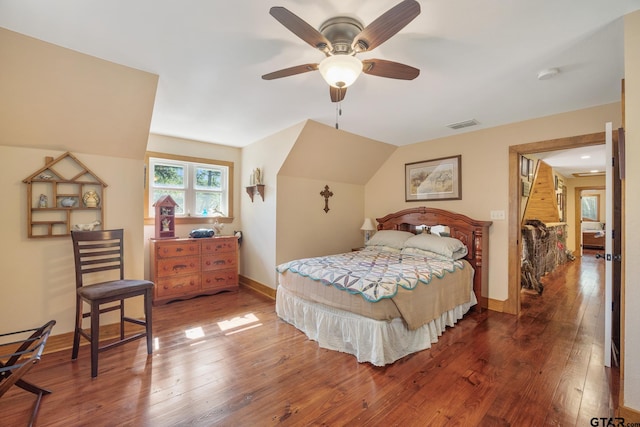 bedroom featuring hardwood / wood-style flooring and ceiling fan