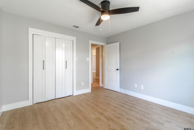 415 Thigpen Dr, Tyler, TX 75703 - unfurnished bedroom with baseboards, light wood-style floors, a closet, and ceiling fan