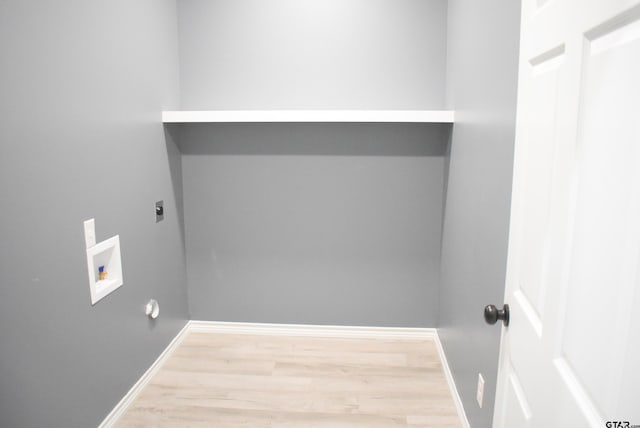 155 Ruby Ln, Nacogdoches, TX 75965 - laundry area featuring electric dryer hookup, wood finished floors, and hookup for a washing machine