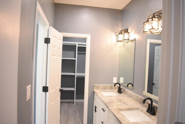 155 Ruby Ln, Nacogdoches, TX 75965 - bathroom with double vanity and wood finished floors