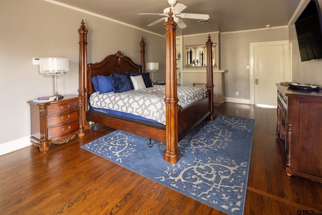 bedroom with a ceiling fan, baseboards, ornamental molding, and wood finished floors