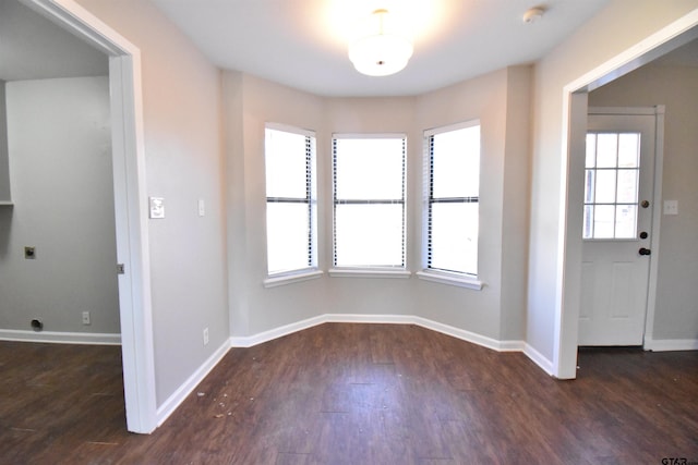 entrance foyer with dark hardwood / wood-style flooring