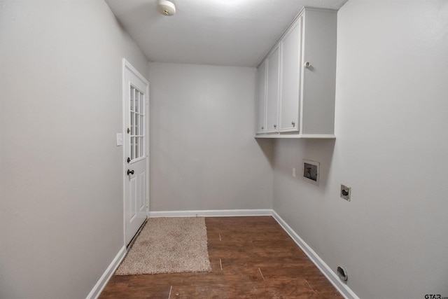 clothes washing area featuring washer hookup, dark hardwood / wood-style flooring, cabinets, and hookup for an electric dryer