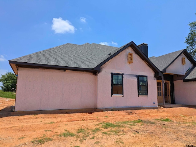 13990 Cedar Vis, Tyler, TX 75704 - view of side of property with roof with shingles and a chimney