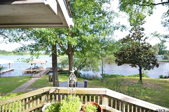 116 Piney Pt, Murchison, TX 75778 - wooden terrace with a water view, a boat dock, and a yard