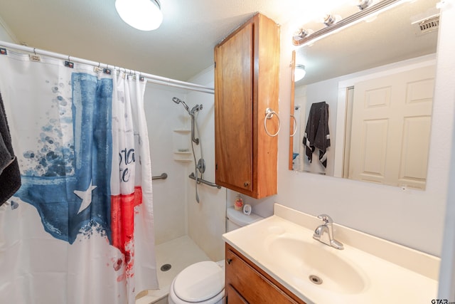bathroom featuring toilet, vanity, a shower with shower curtain, and visible vents