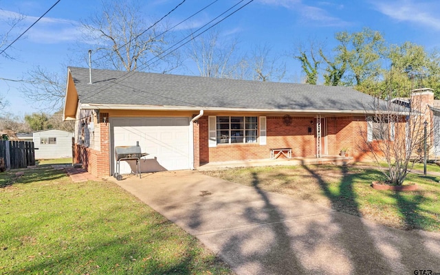 ranch-style house with a garage and a front yard