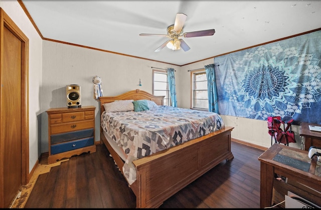 bedroom featuring ceiling fan, dark hardwood / wood-style flooring, and ornamental molding