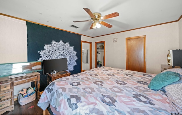 bedroom featuring ceiling fan and crown molding