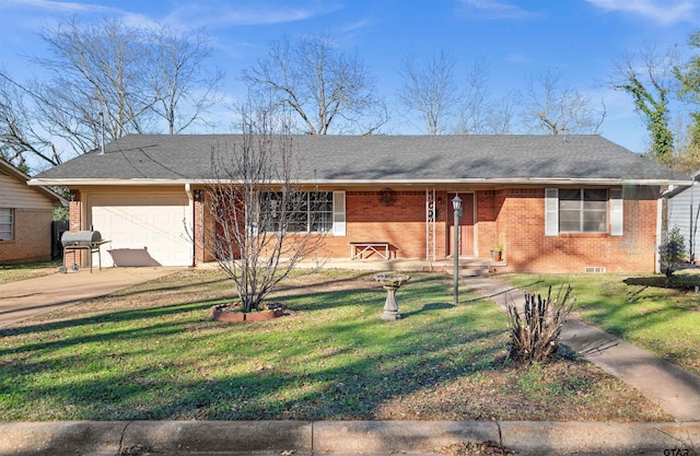 ranch-style home featuring a front yard and a garage