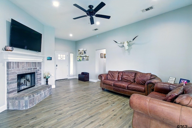 1112 E Park Dr, Lindale, TX 75771 - living area featuring wood finished floors, a ceiling fan, recessed lighting, a fireplace, and baseboards
