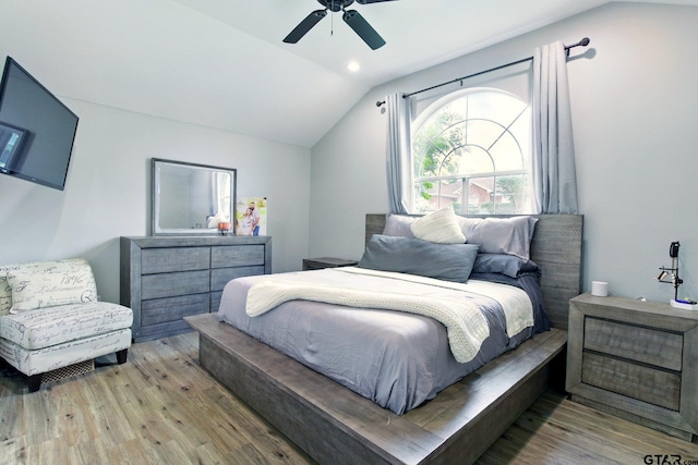 1112 E Park Dr, Lindale, TX 75771 - bedroom with lofted ceiling, light wood-style floors, and a ceiling fan