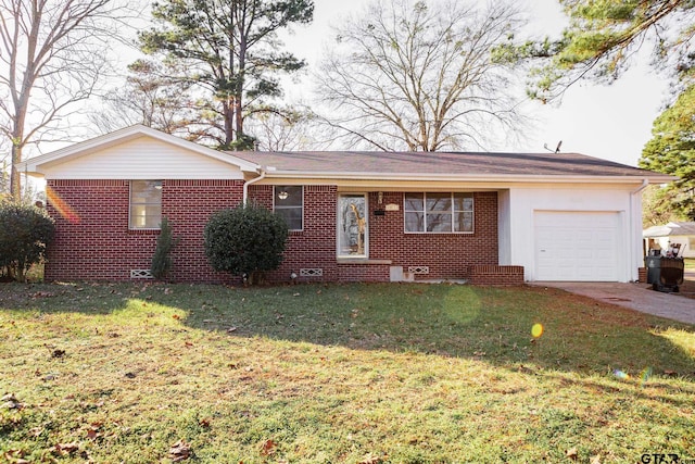 single story home with a front yard and a garage