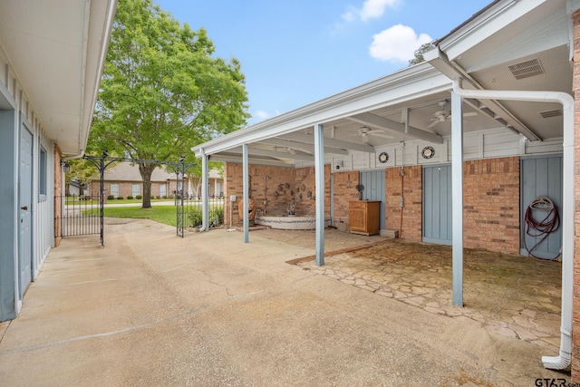 view of patio / terrace with a carport