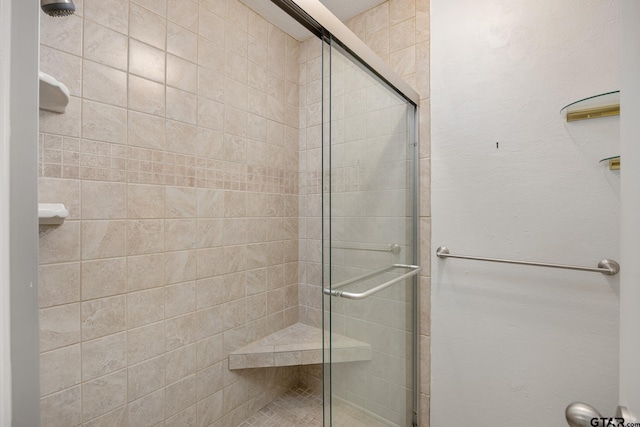 bathroom featuring a stall shower