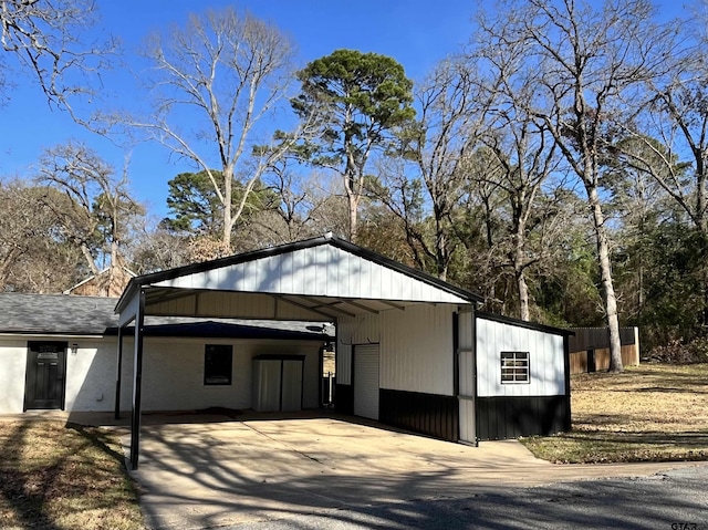 view of side of home featuring a carport