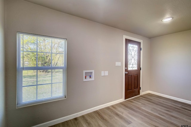 foyer featuring hardwood / wood-style flooring