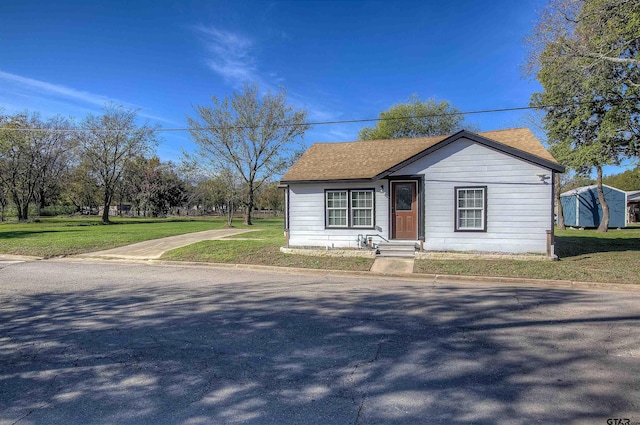 view of front of home with a front yard