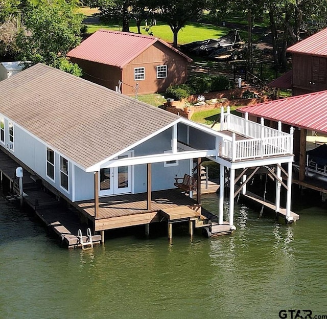 dock area with a water view