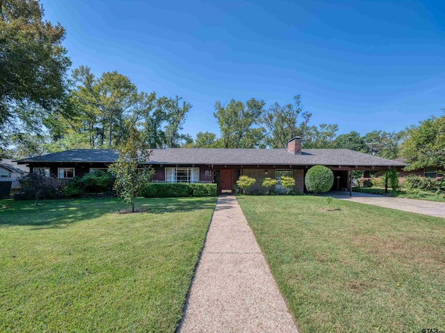 ranch-style house with a front lawn