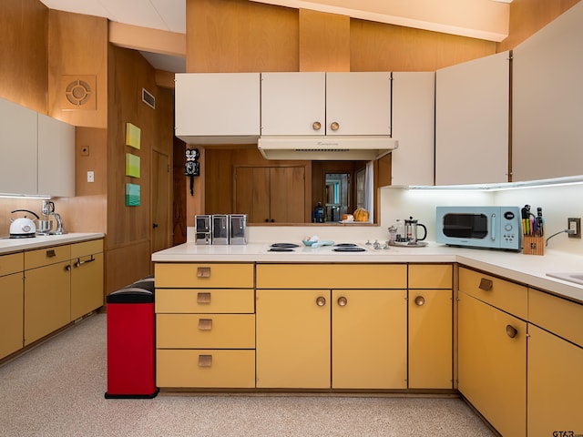 kitchen featuring white stovetop