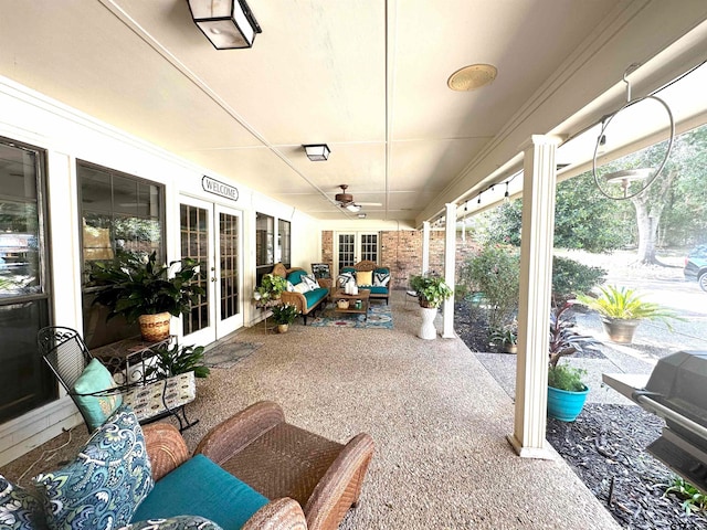 view of patio featuring french doors, grilling area, and ceiling fan