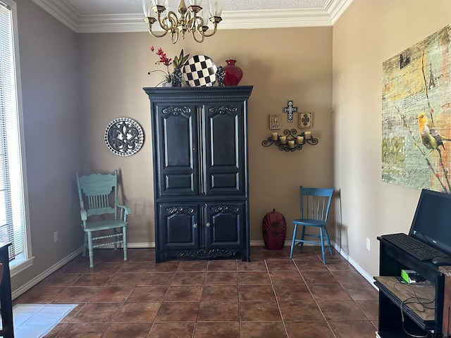 living area with dark tile patterned flooring, a chandelier, and ornamental molding