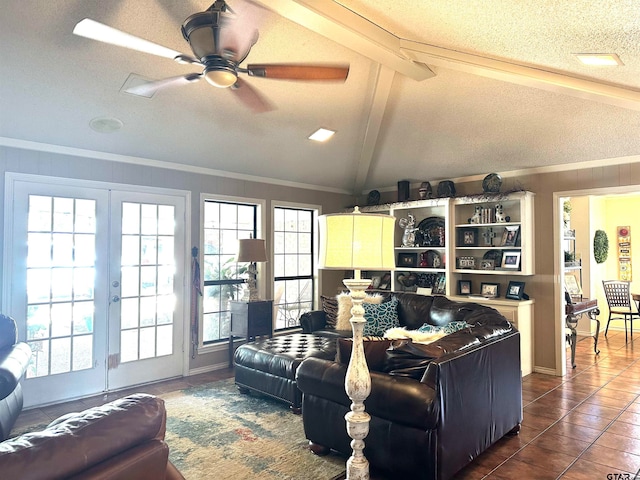 living room featuring lofted ceiling with beams, dark tile patterned flooring, a textured ceiling, and ceiling fan