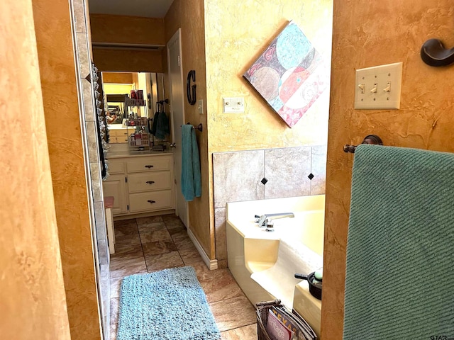 bathroom featuring a tub to relax in