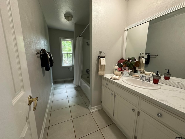 bathroom featuring vanity, tile patterned floors, and shower / bathtub combination with curtain