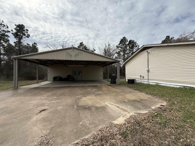 view of side of home featuring a carport